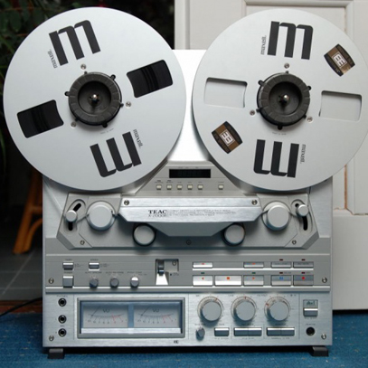 Girl, You'll Be a Woman Soon - Mia's reel to reel tape deck in