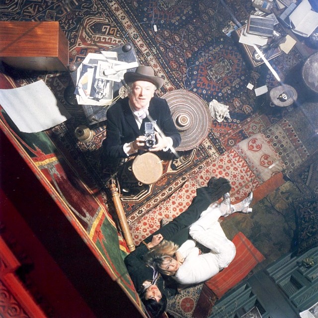 Cecil Beaton photographing Mick Jagger and Anita Pallenberg on the set of PERFORMANCE. 1970