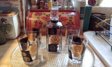1950s black and gold decanter and double old fashioned glasses set